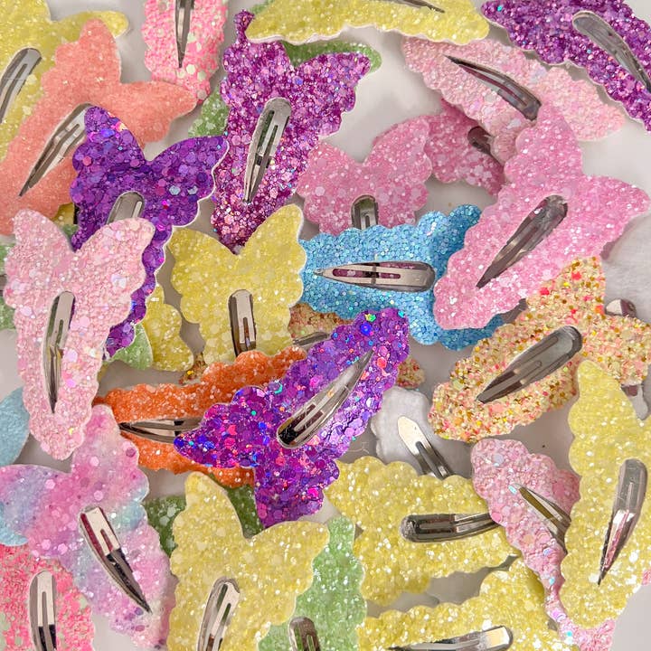 Assortiment vlinder haarclips voor wholesale door Sparkling New Baby, LLC.