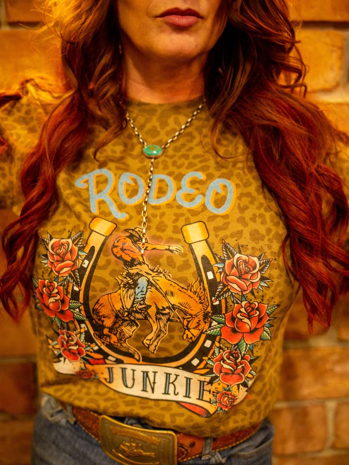 LAT Brown Leopard Rodeo Junkie Turquoise Lettering Graphic T-Shirt for wholesale on Faire