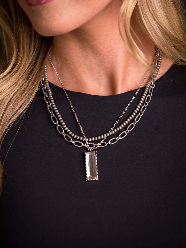 Silver Multi Layered Necklace with Rhinestone Bar Pendant for wholesale by West & Co.