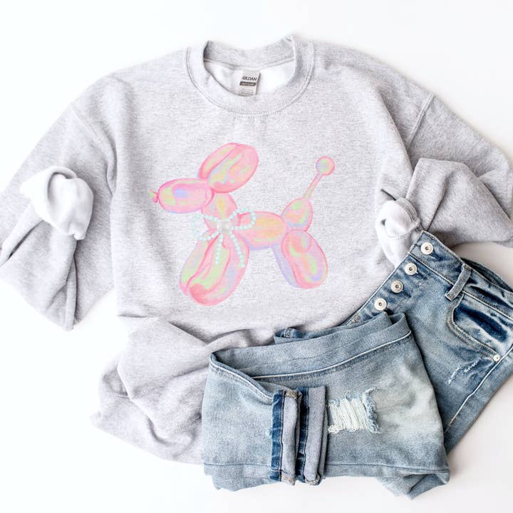 Sweatshirt graphique avec nœud et caniche en ballon rose pastel Coquette pour la vente par Par.tees by Party On!