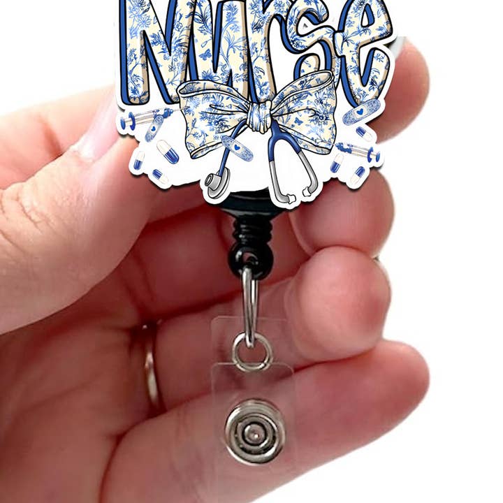 Nurse Coquette Blue Bow with Stethoscope Acrylic Badge Reel for wholesale by Good Girl Gone Badge