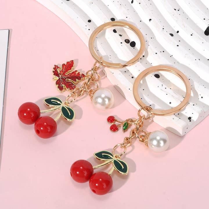 Fashion Red Cherry Fruit Key Chain and other Purchase Wholesale chinese handbag. Free Returns & Net 60 Terms on Faire trending on Faire.