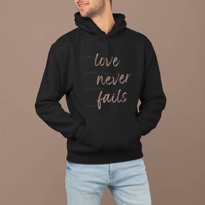 SUDADERA CON CAPUCHA LOVE NEVER FAILS para venta al por mayor de SALT IN ALASKA