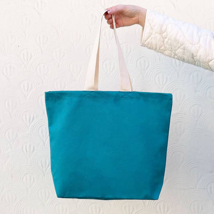 Grote canvas draagtas in tropisch blauw voor wholesale door Alphabet Bags