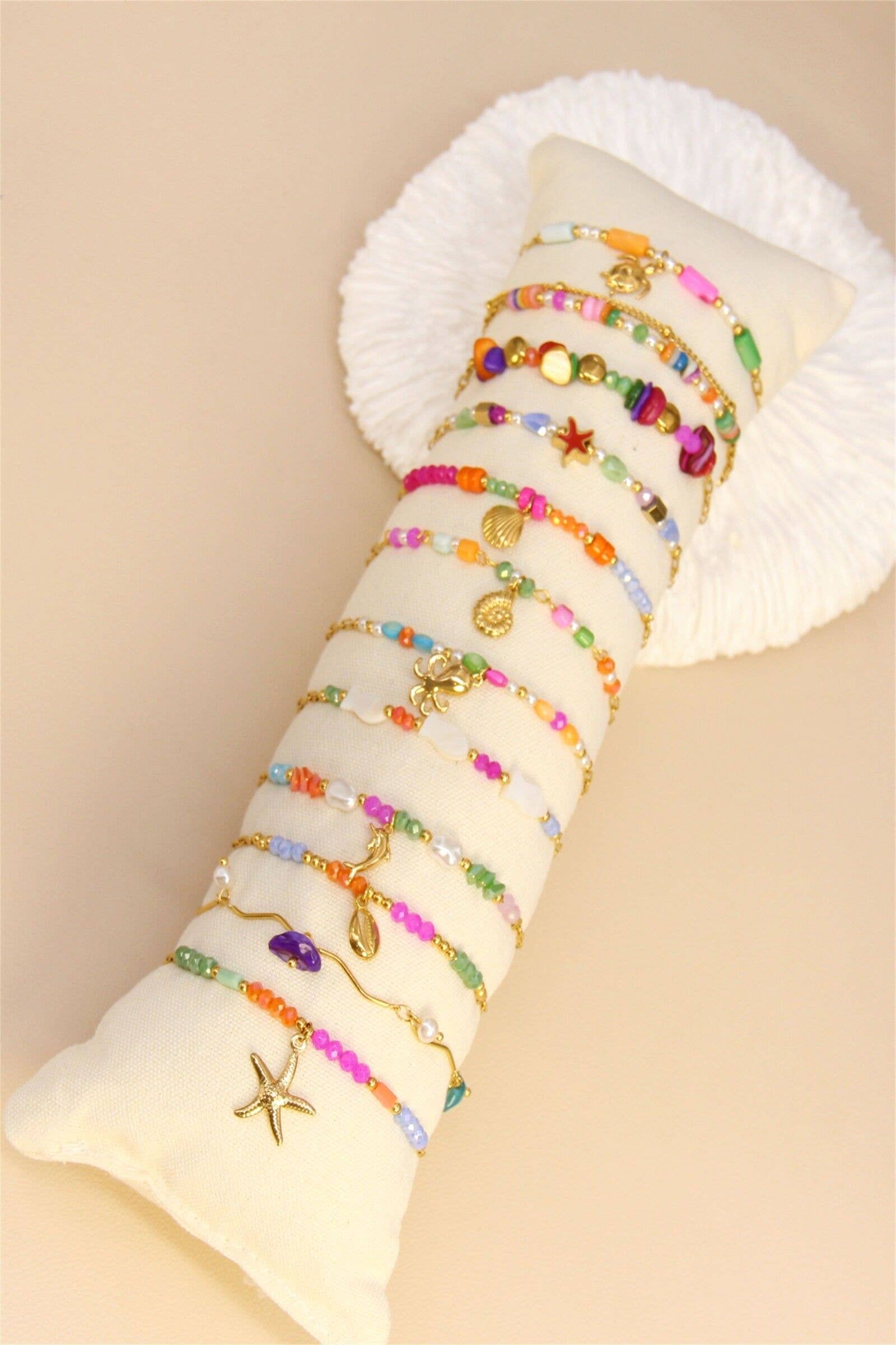 BELLISSIMA BIJOUX - Venta al por mayor Juegos de joyas - Set de 12 pulseras edición arcoíris de acero inoxidable1