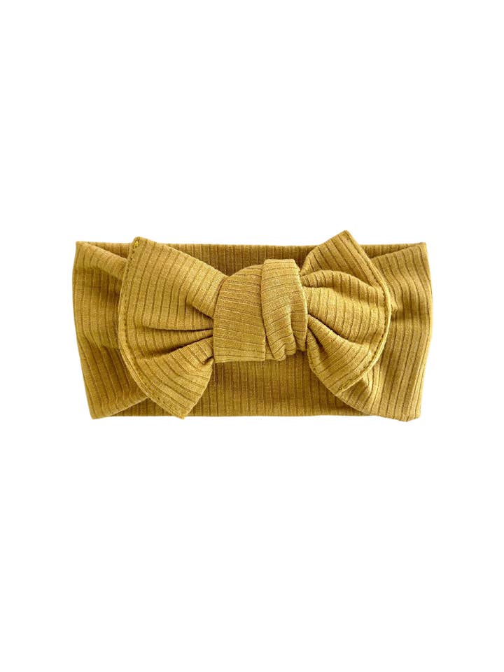 Bandeau pour bébé avec nœud jaune soleil pour la vente par Celebrate Your Tribe
