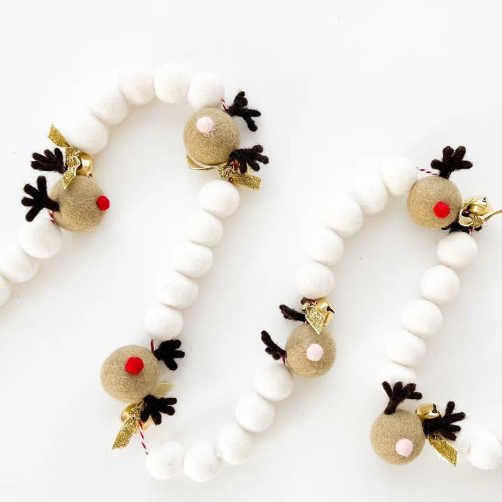 Sleigh Bells Felt Ball Garland for wholesale by Pearl & Jane