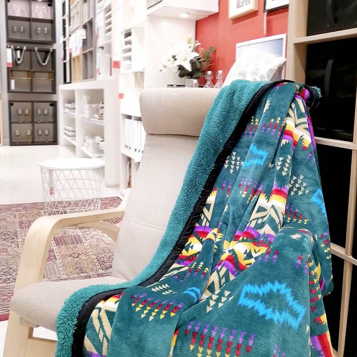 NUNA Sherpa-Lined Throw Blankets for wholesale by Flag Matrix Inc