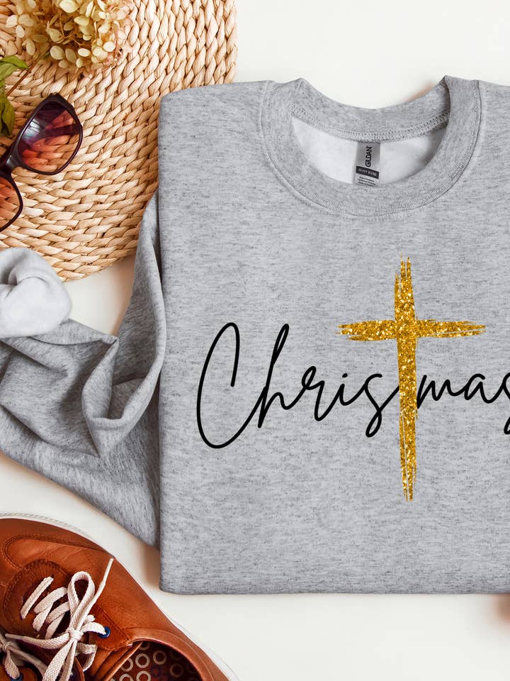 Christmas with Gold Cross- Graphic Tee and other Purchase Wholesale glitz and glam. Free Returns & Net 60 Terms on Faire trending on Faire.