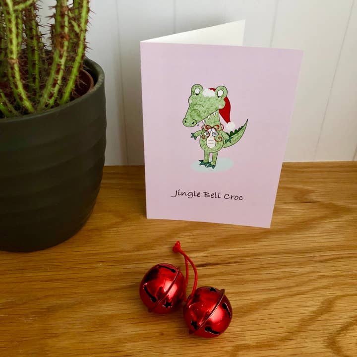 Jingle Bell Croc Greeting Card for wholesale by Quack Animal Art
