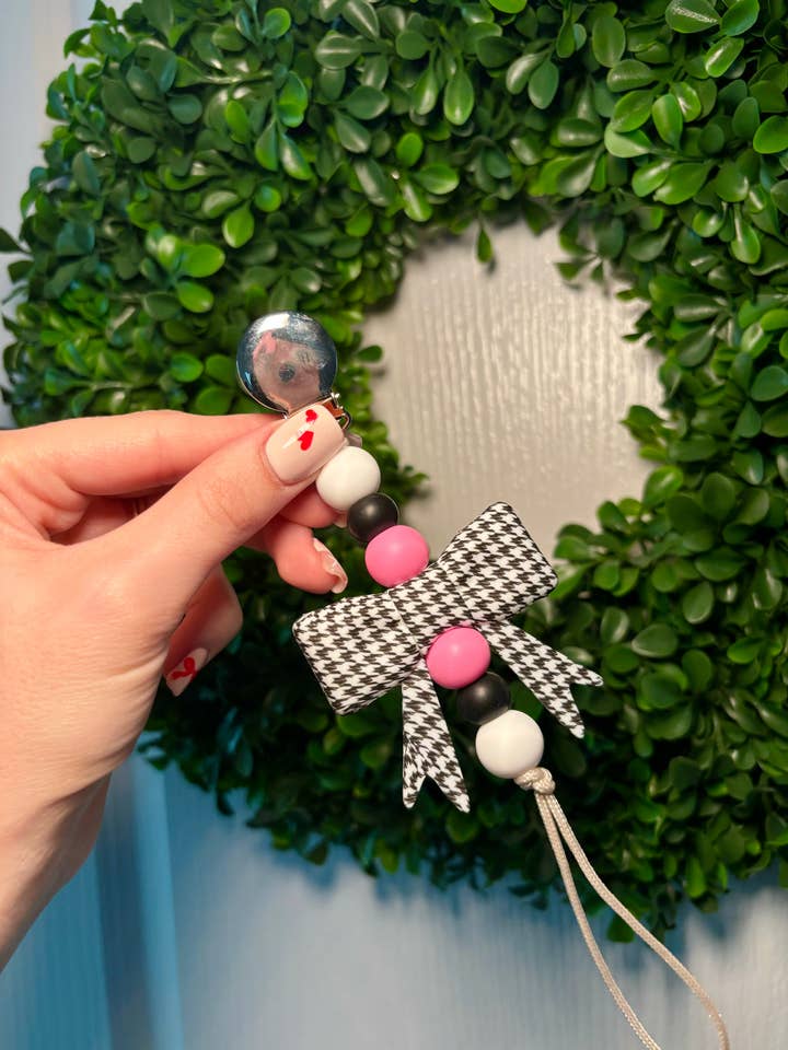 Houndstooth Bow Paci Teething Clip for wholesale by Clip and Coast