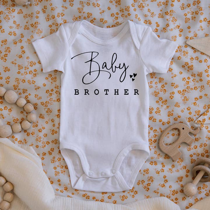 Baby Brother Pregnancy & Gender Reveal Onesie for wholesale by Claire and Bella