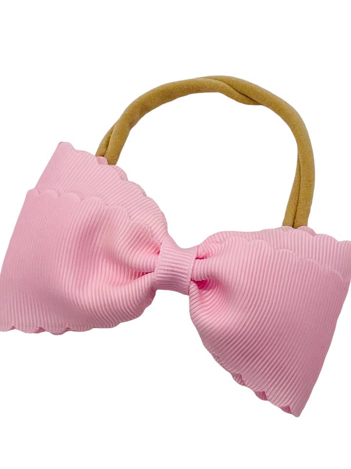 Cerchietto per bebè Scallop «Lottie» per la vendita all'ingrosso da parte di Winn and William