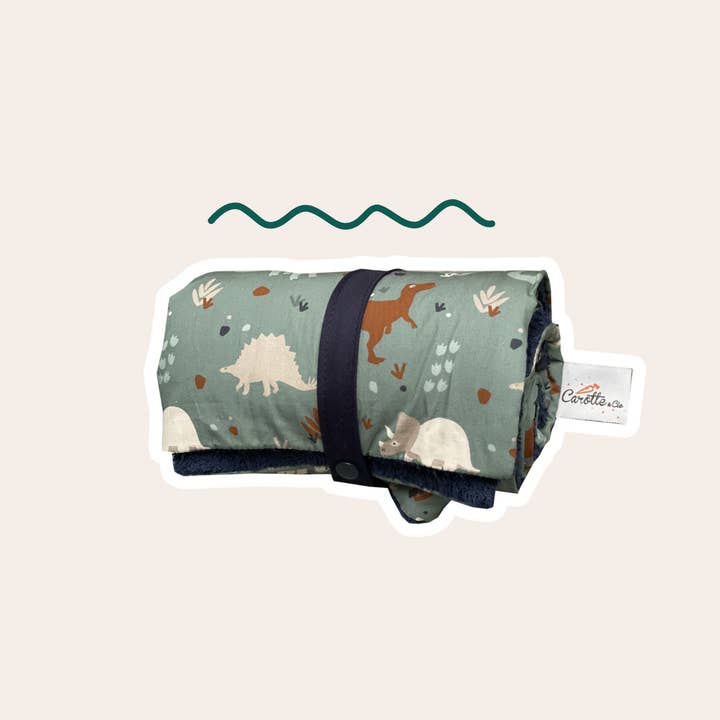 Manta nómade Dinossauros verde por atacado de Carotte & Cie