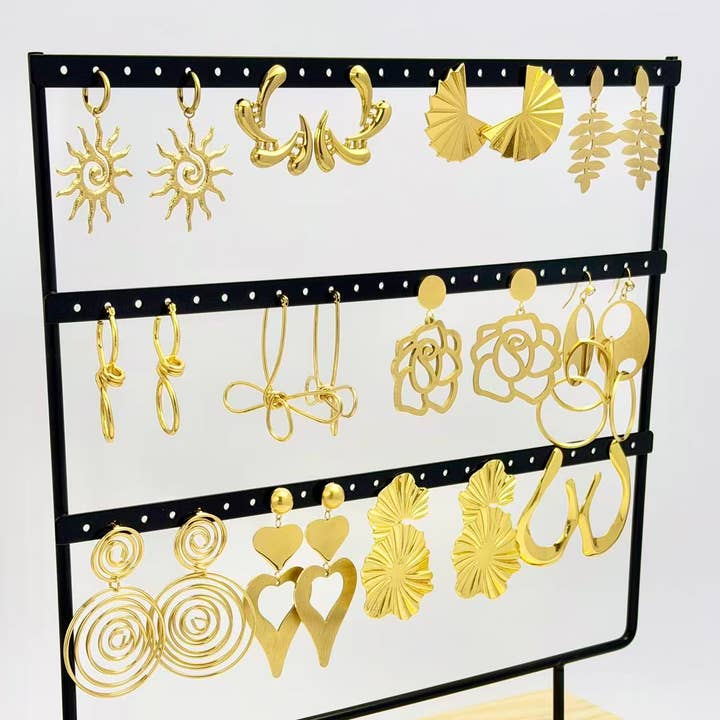 COSMOS - Wholesale Jewelry Set - Lot of 12 pairs of stainless steel earrings on display2