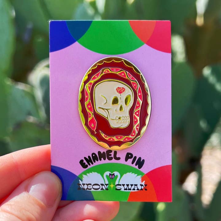 Skull and Snake Enamel Pin for wholesale by Neon Swan Studio LLC