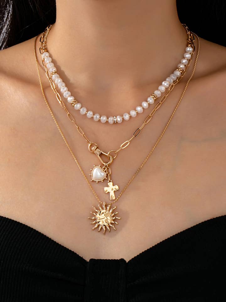 MULTI BEADED LAYER SUN HEART CROSS CHARM NECKLACE | 80N92499 for wholesale by JOSSLYN by wall to wall