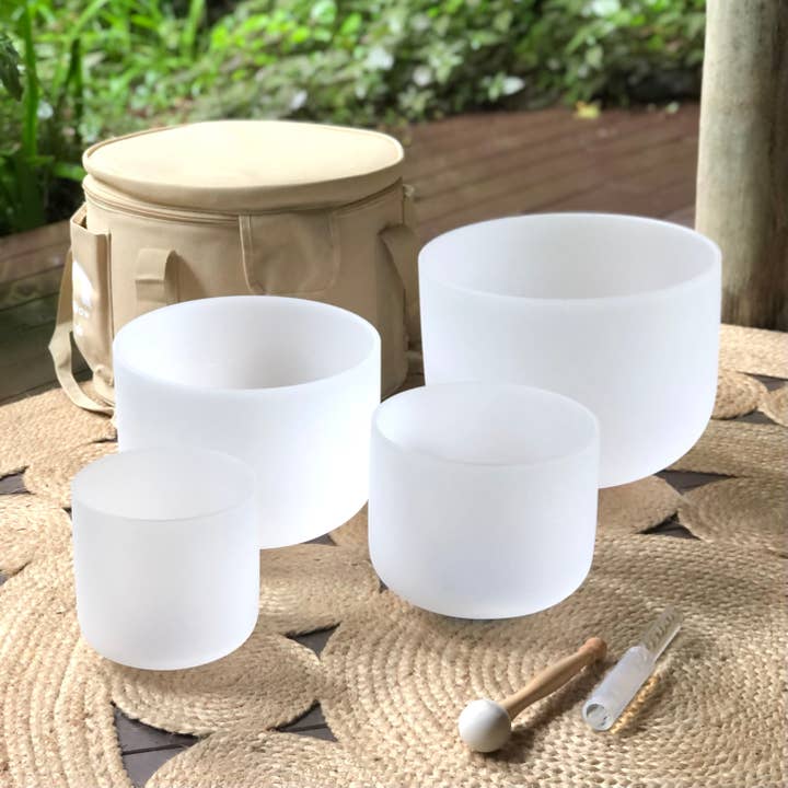 Set of 4 White Crystal Singing Bowls in Beige Bag for wholesale by Rainbow Sounds