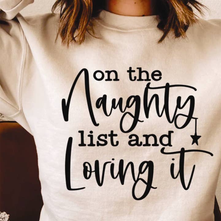On The Naughty List And Loving It Crew Sweatshirt for wholesale by Peach Closet