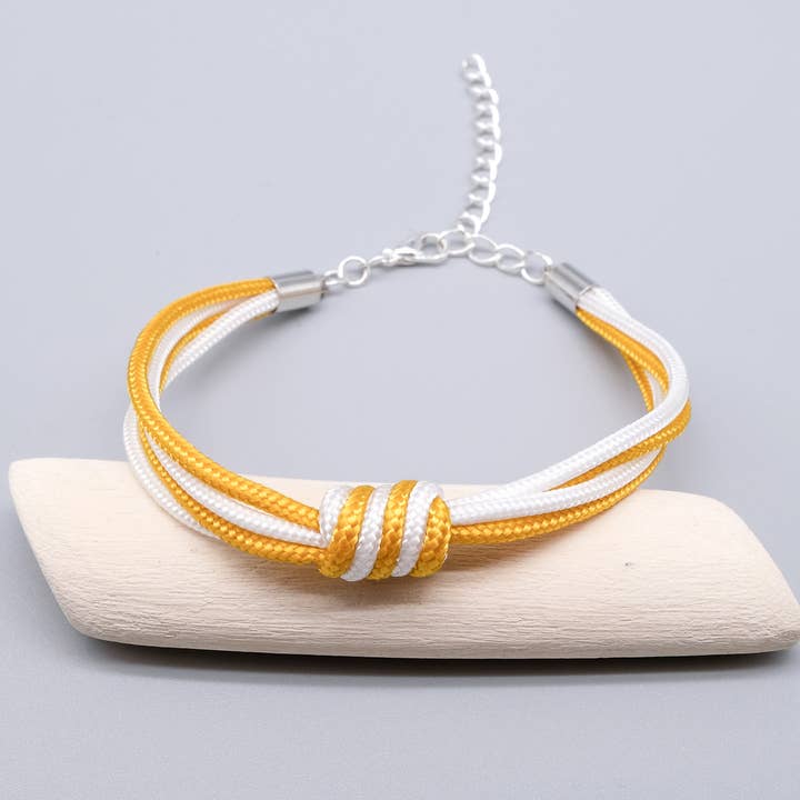 Yellow and White Spiral Knot Paracord Bracelet for wholesale by La Fabrique du Noeud