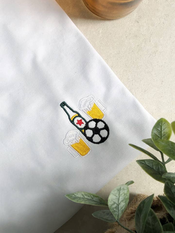 White Embroidered t-shirt - Soccer beer for wholesale on Faire0