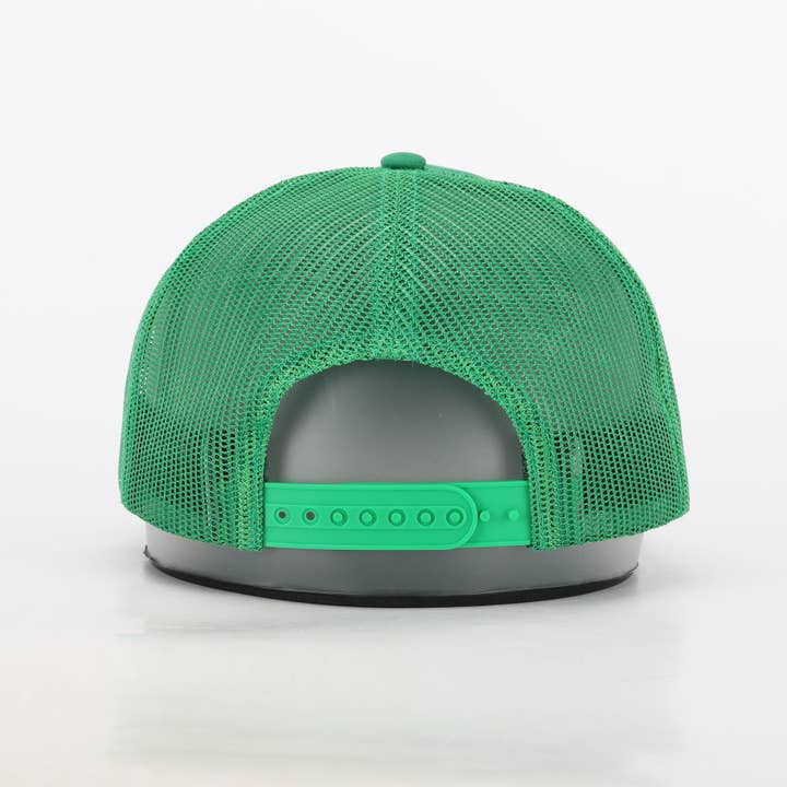 Meet Me Under The Mistletoe Trucker Hat in Green for wholesale on Faire6