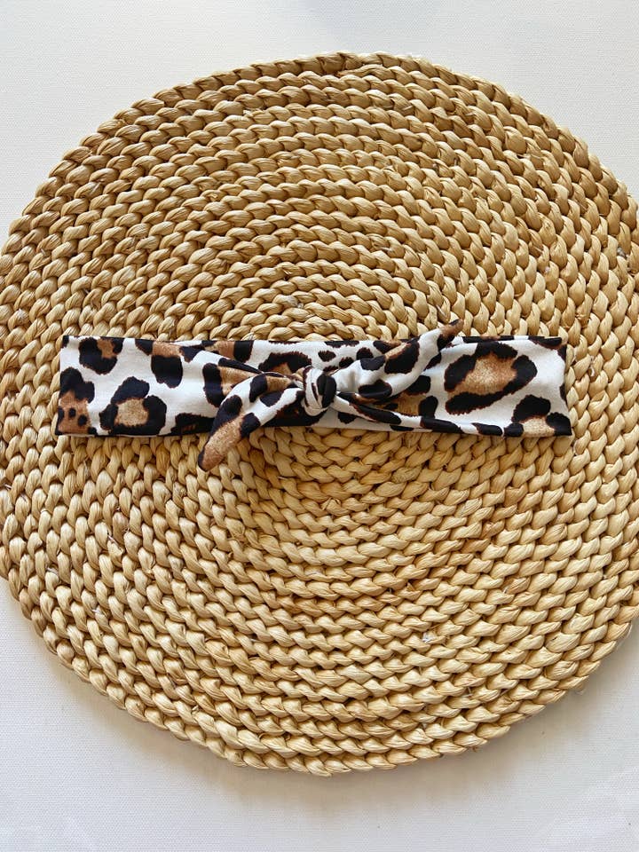 Ivory leopard adjustable tie headband for wholesale by Twig + Roe