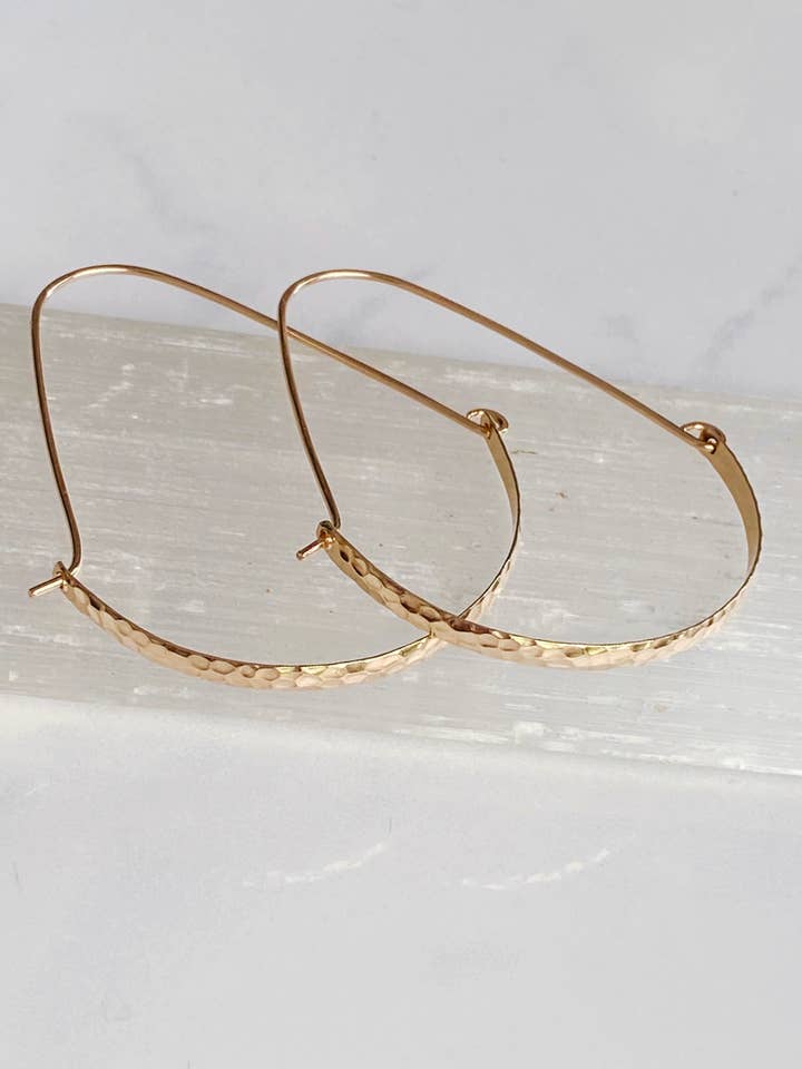 Hammered swing hoops for wholesale by Bonnie Boardman Jewelry