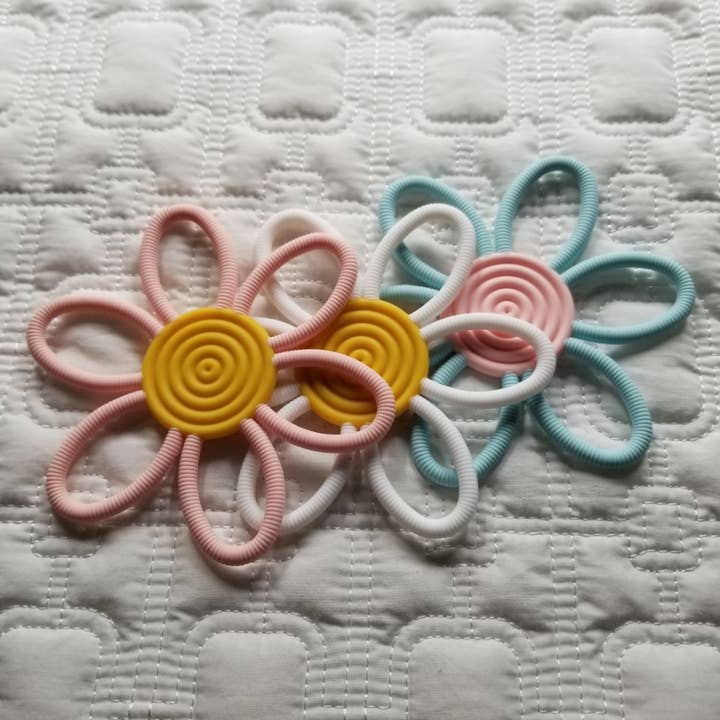 Daisy Silicone Teether Toy and other Purchase Wholesale tuffy teether. Free Returns & Net 60 Terms on Faire trending on Faire.