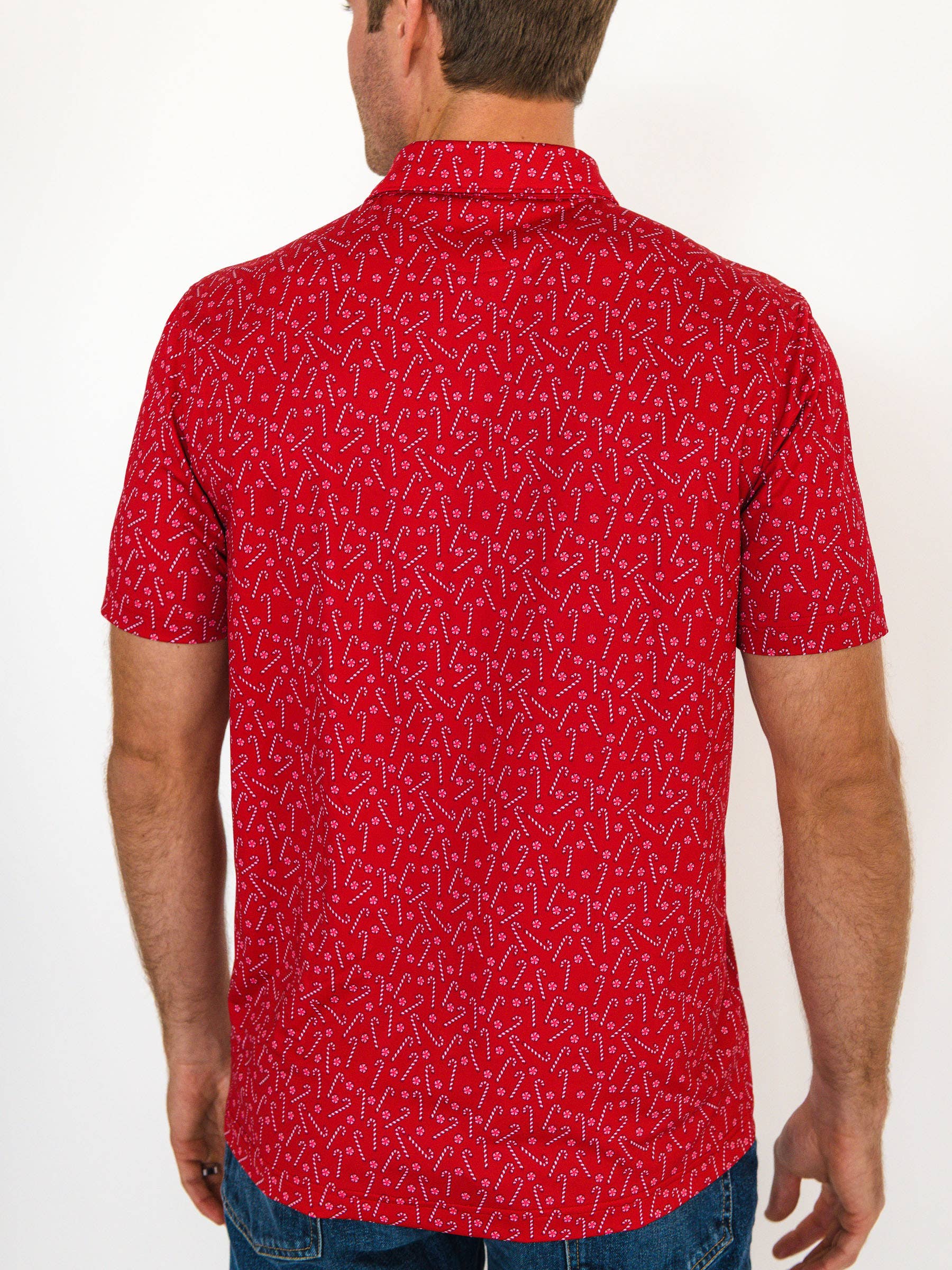 Red Men's Tiny Candy Canes Knit Short Sleeve Performance Polo for wholesale on Faire2