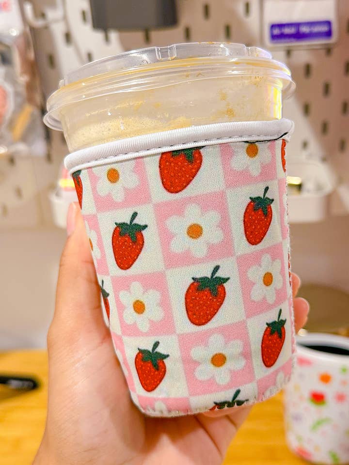 Checkered Strawberry & Daisy Coffee Sleeve for wholesale by BlushedDesigns Co.