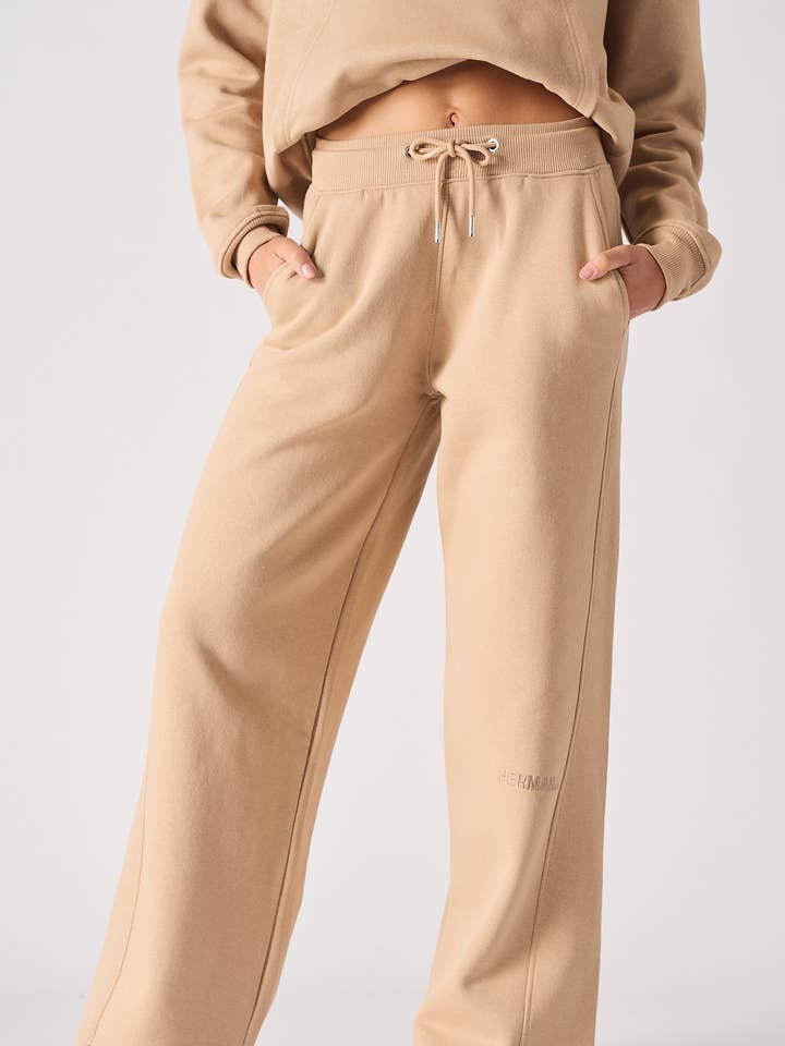 JOGGERS À JAMBES LARGES - BEIGE pour la vente par HERMAN & CO