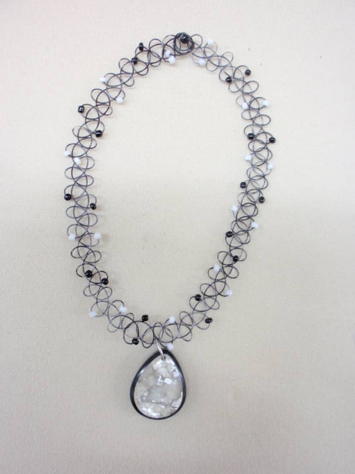 ZWART-WITTE TATOEAGE MET ZWART-WITTE DRUPPELVORMIGE SCHELP P voor wholesale door International Duru's