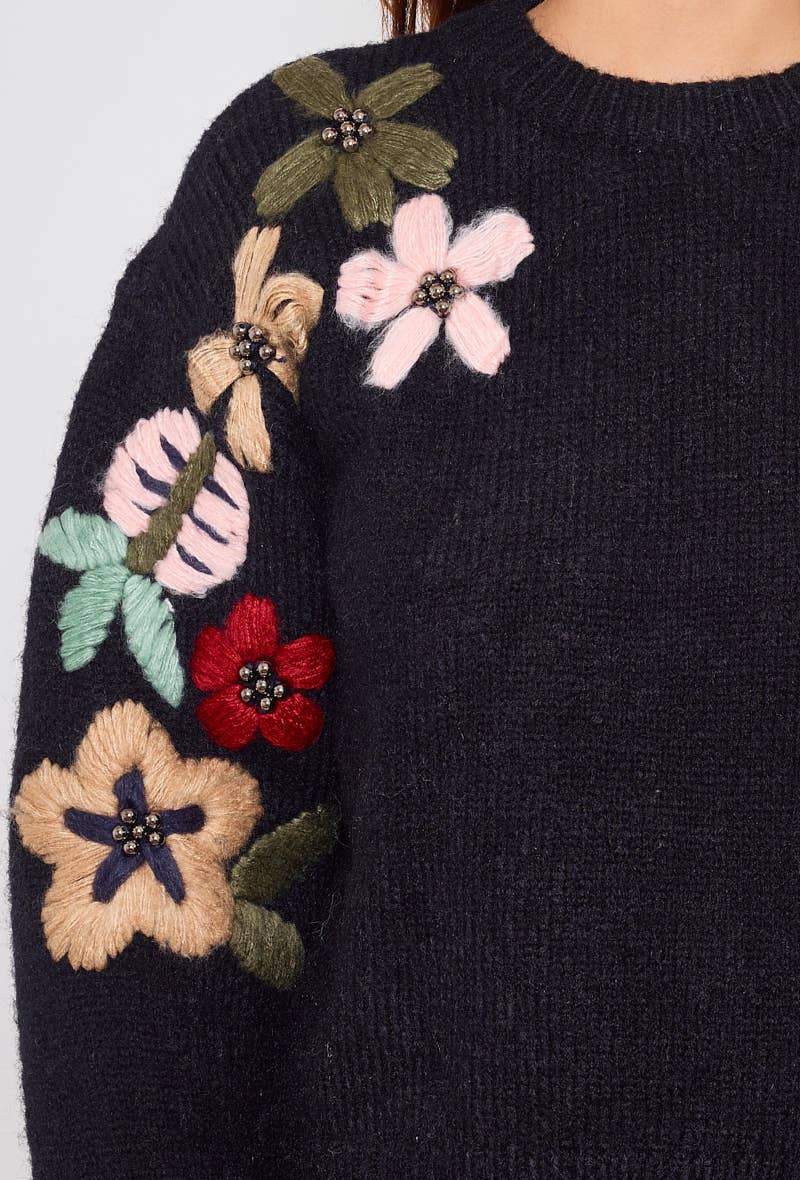 Black Round neck sweater with hand-embroidered flower on the sleeves for wholesale on Faire3