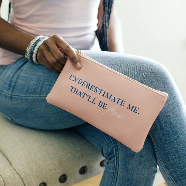 Blush Underestimate Me Zip Pouch for wholesale on Faire