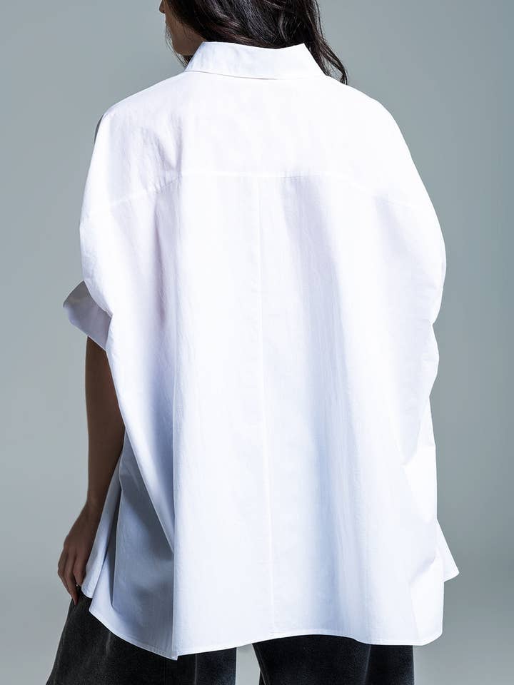 Bianco Blusa oversize bianca a maniche corte in vendita all'ingrosso su Faire1