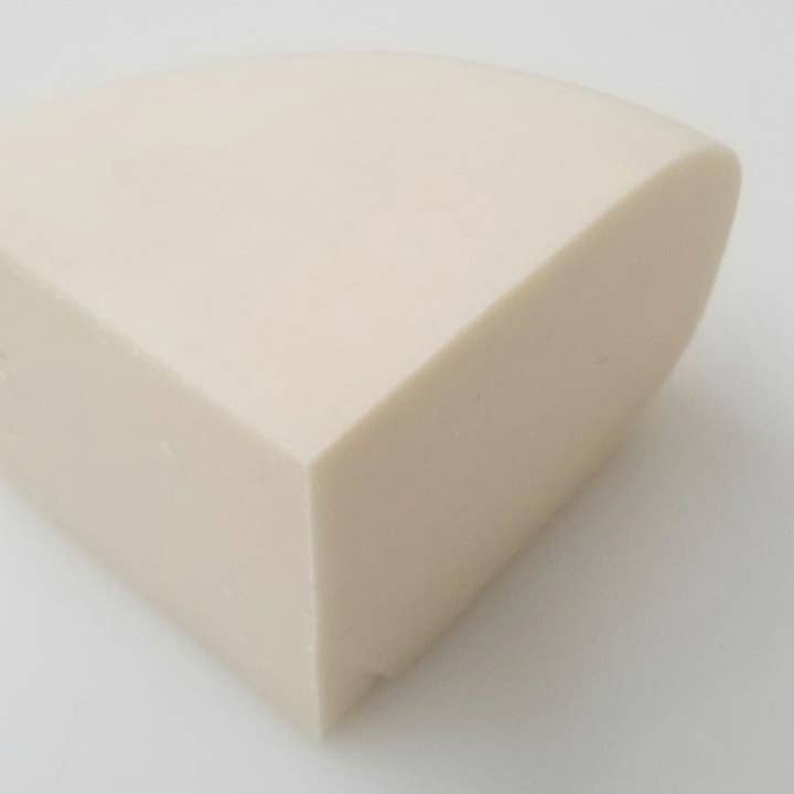 Tilsit Cheese Quarter Wedge for wholesale by Eichtens Cheese