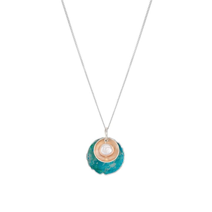 Pod style necklace silver and aluminium with a fresh water pearl incast inside. for wholesale by Rachel Stowe Jewellery