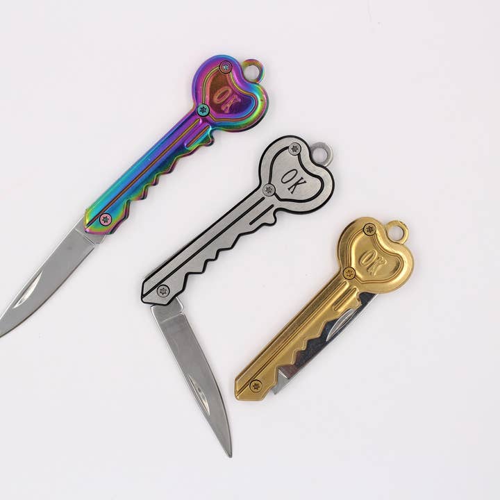 Rainbow Knife Keychain – ‘OK’ Utility Pocketknife – 2" Blade for wholesale by Real Sic