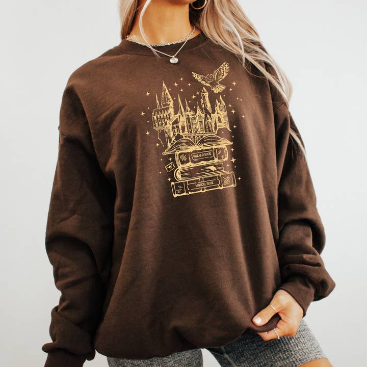 Wizard Book Castle Graphic Sweatshirt for wholesale by The Boho Haus