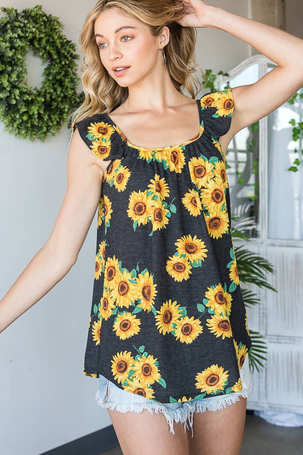 NERO TOP FLOREALE CON VOLANT in vendita all'ingrosso su Faire7