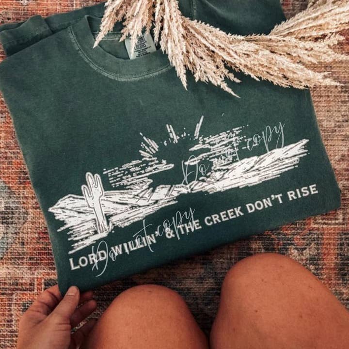 Moss Lord Willing & The Creek Don't Rise Faith Western Comfort Colors Graphic Tee for wholesale by ZZ Threadz