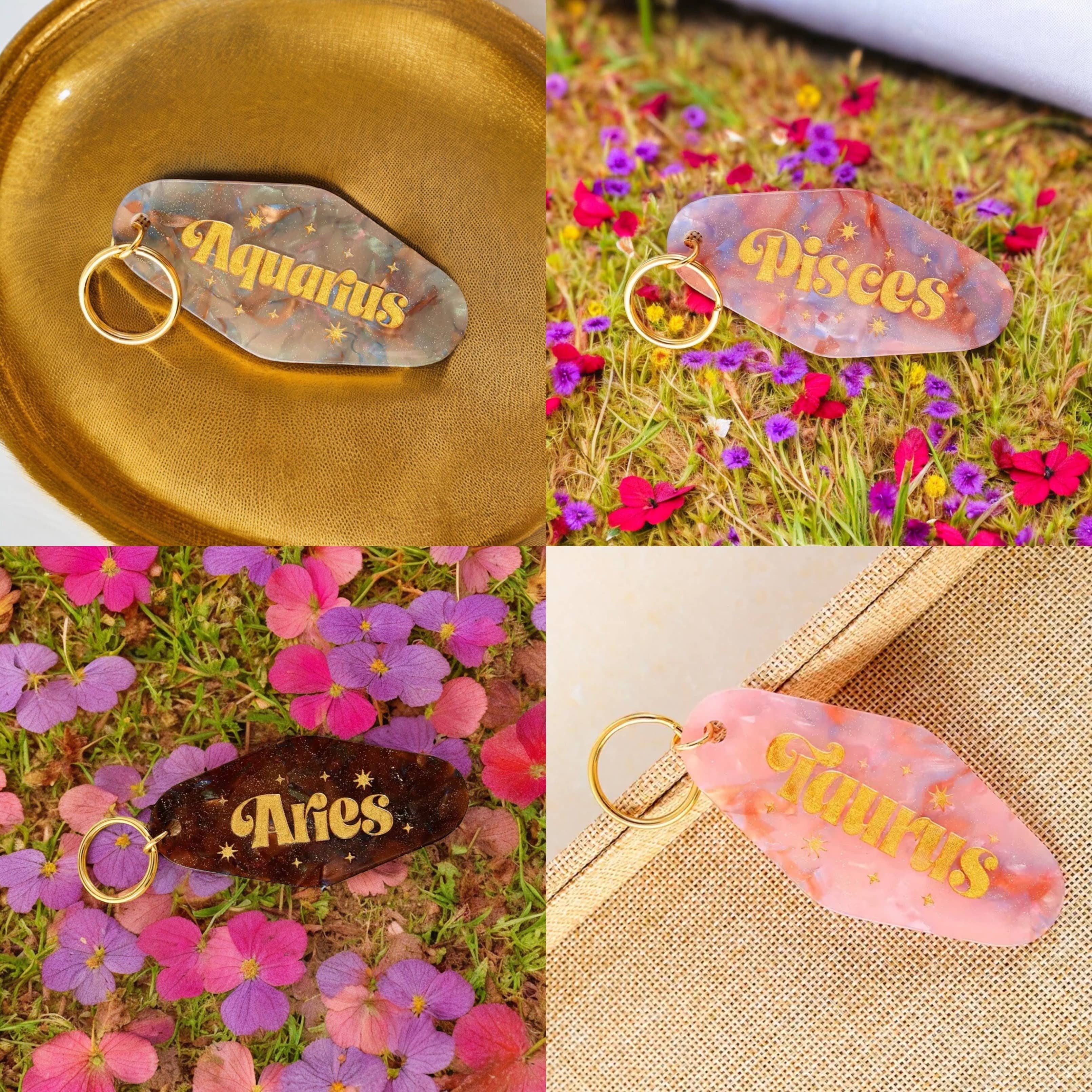 Threads And Needles, INC. – Großhandel Schlüsselanhänger – Damen – Schlüsselanhänger mit Tierkreiszeichen0