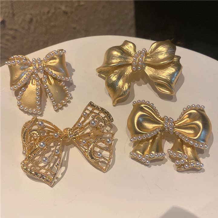 Tourtiwi - Wholesale Brooch - Gold-tone pearl bow brooch