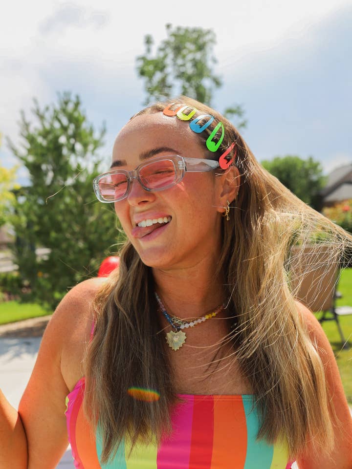 FERMAGLI A SCATTO NEON (CONFEZIONI DA 10) per la vendita all'ingrosso da parte di KAXI