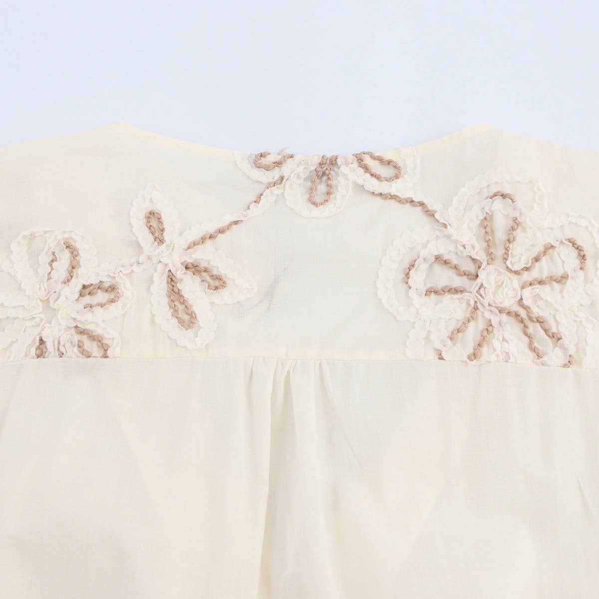 Beige Floral Embroidery MiniDress with Drawstring Cutout_CWDSD8316 for wholesale on Faire10