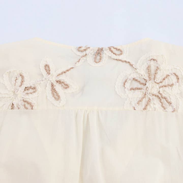 Beige Floral Embroidery MiniDress with Drawstring Cutout_CWDSD8316 for wholesale on Faire10