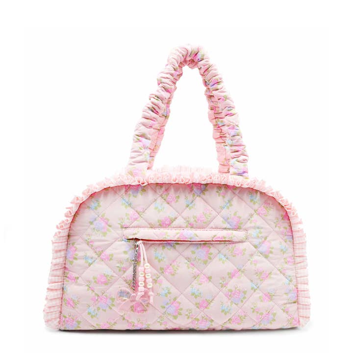 Sac polochon moyen matelassé à imprimé floral pour la vente par OMG Accessories