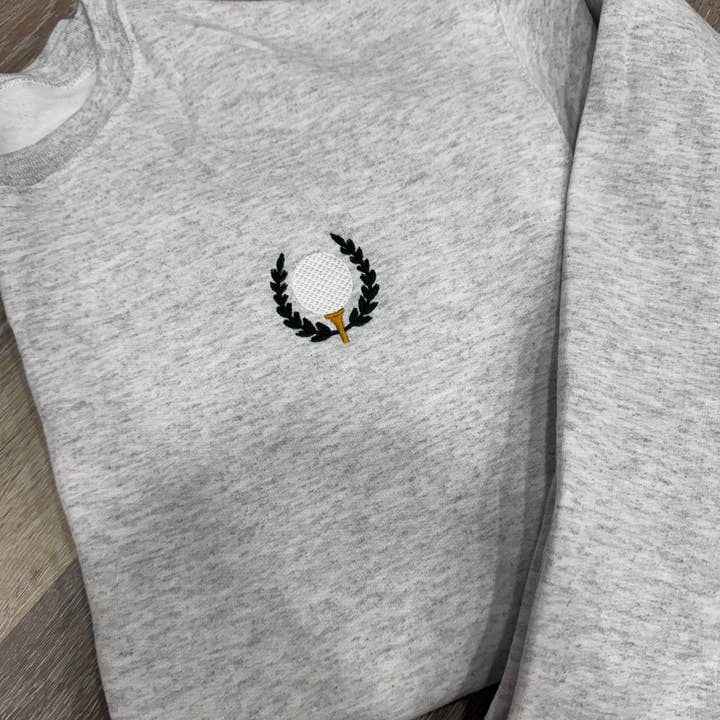 Golf Ball Tee Wreath Embroidered Sweatshirt for wholesale by M. Anderson Design