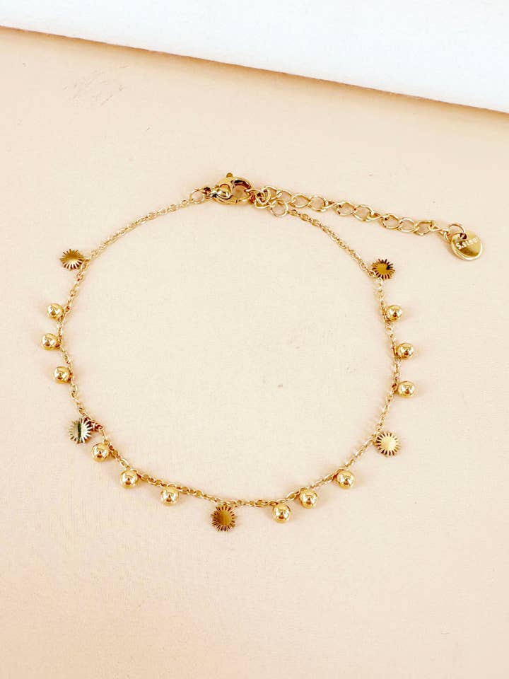 Bracelet chaîne perles et soleil en acier inoxydable pour la vente par D Bijoux